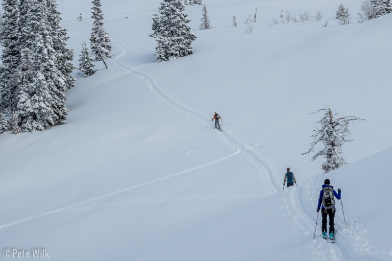 Skinning up the last bit to Dead Snag knoll for the start of the exit.