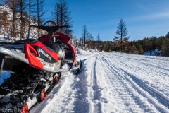 The crag is located on private property and requires permission and a 10-12 miles of snowmobiling to get to.