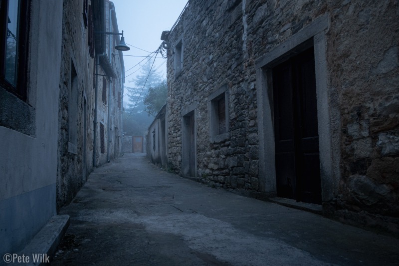 Foggy morning on narrow streets.