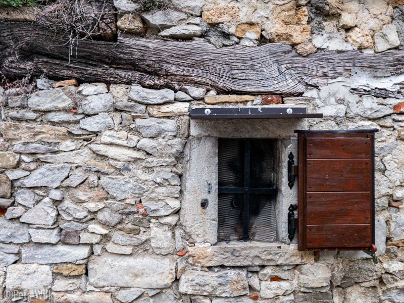 The construction in Old Town Buzet was a hodgepodge of renovated ancient buildings and things like this that seeming were build with field stones and a barely lumbered tree.