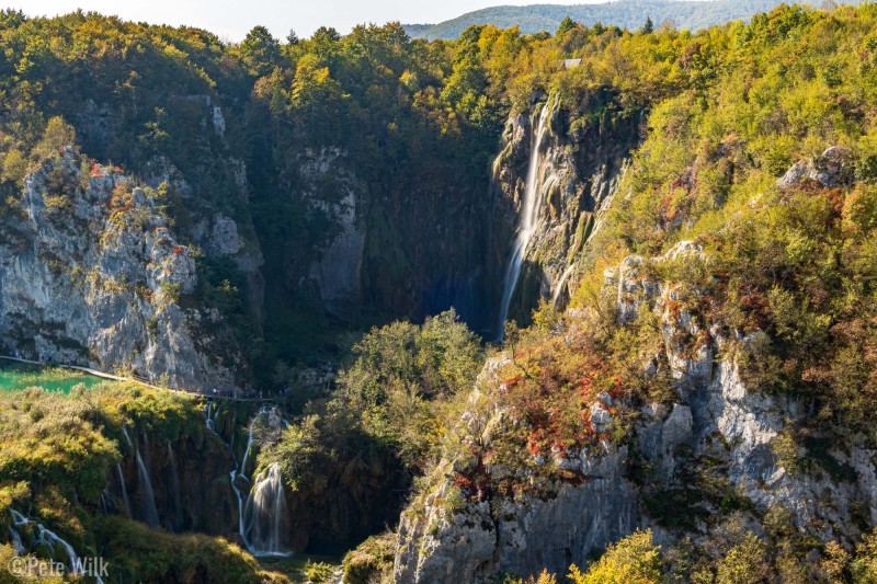 Plitvice Lakes National Park is one of the most popular tourist attractions in Croatia.  It is a collection of naturally formed lakes and endless waterfalls.  Here the big waterfall (Veliki Slap, 87m) can be seen along with, if you look closely, one of the many boardwalks.