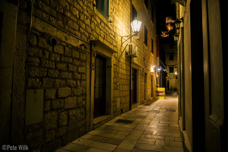 Lots of tiny alleys in Old Town Omiš, all of them without car access.  The sign is in front of the place we had dinner.