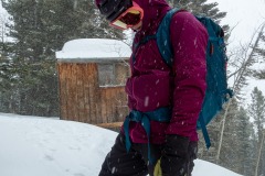 Carly psyching up for our descent.  Conditions were windy and snowy.